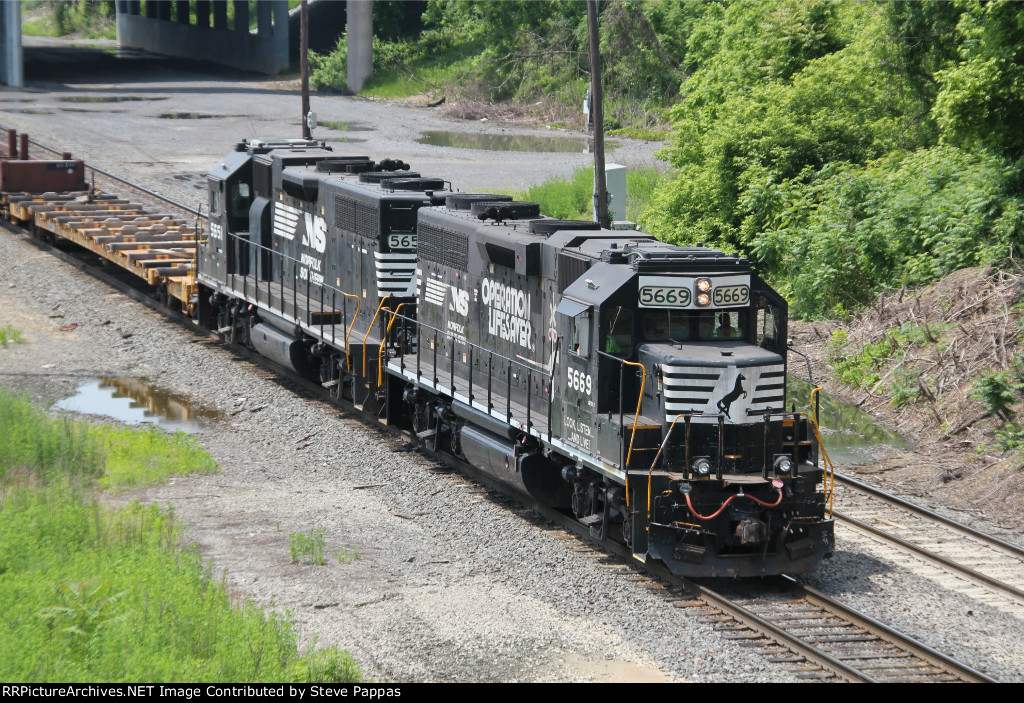 NS units leading a train out of Enola yard